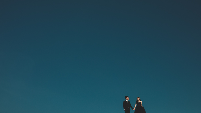 Melaka blue sky, couple in black gown