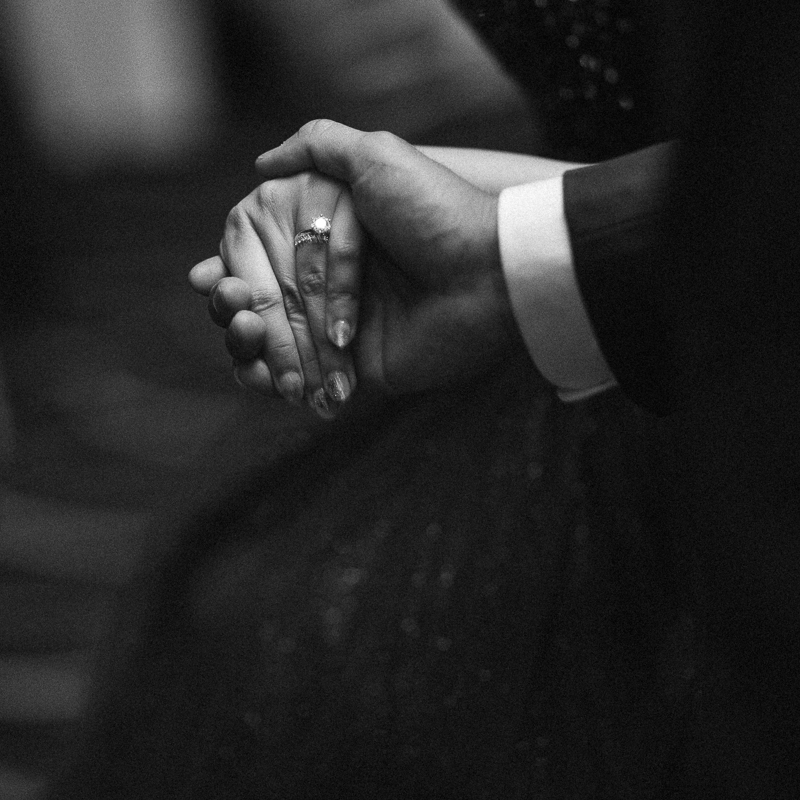 Holding hands, wedding ring